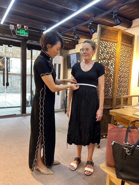 Fitting the qi pao